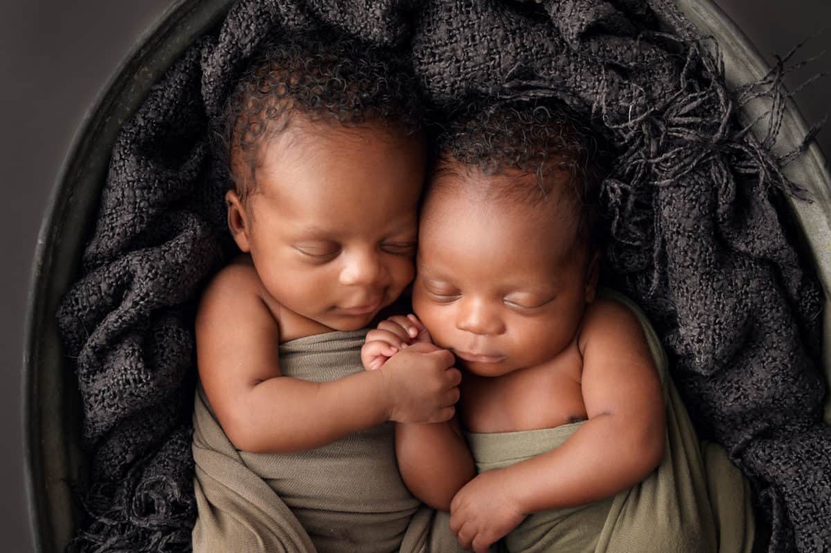 baby twin boys cuddling