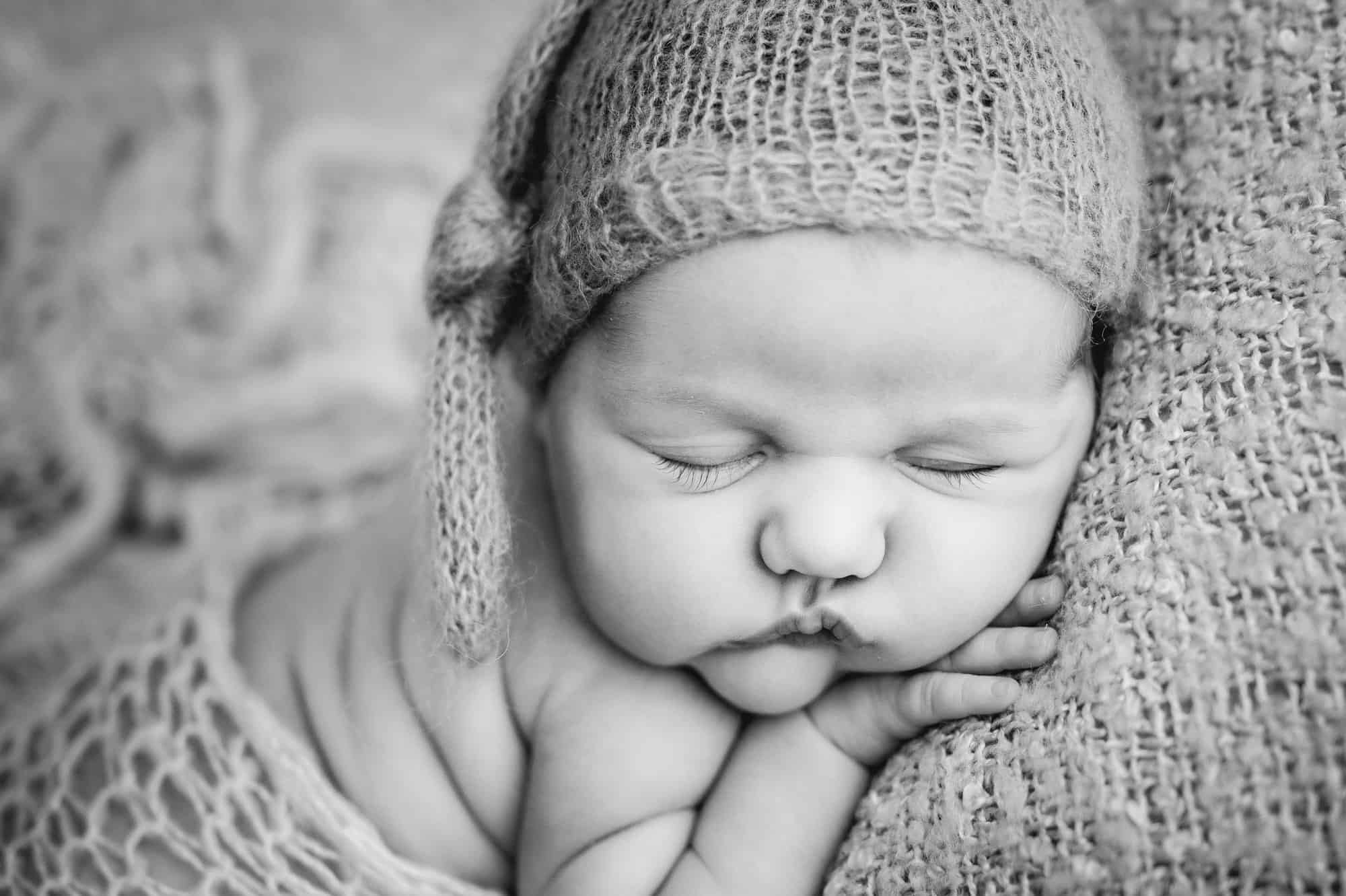 sleeping newborn photograph in black and white